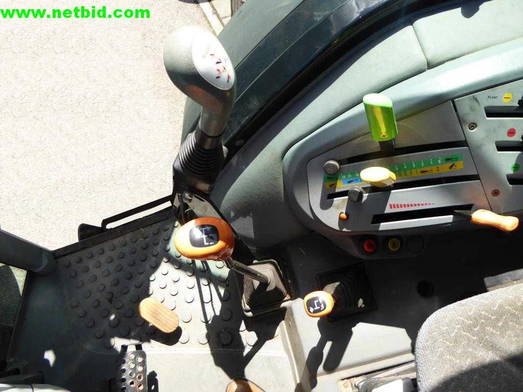 compact tractor including attachments-6