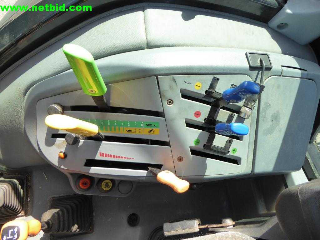 compact tractor including attachments-7