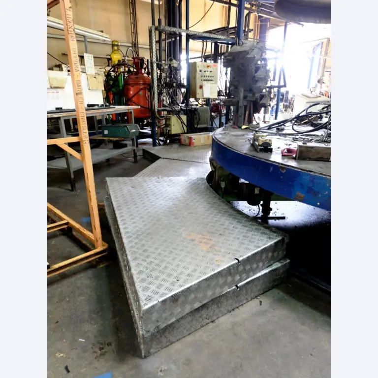 Machines for the manufacturing of foamed <br>and injected attachments and spare parts <br>for the automotive sector-10