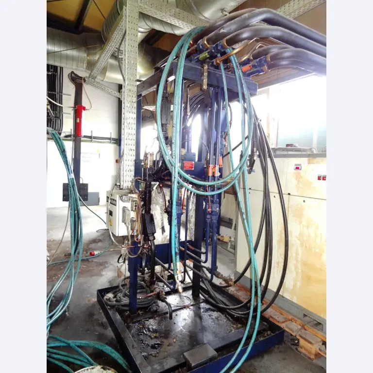 Machines for the manufacturing of foamed <br>and injected attachments and spare parts <br>for the automotive sector-6