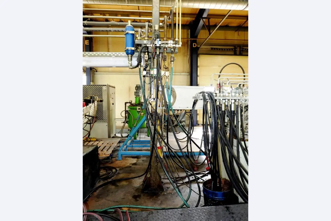 Machines for the manufacturing of foamed <br>and injected attachments and spare parts <br>for the automotive sector-9