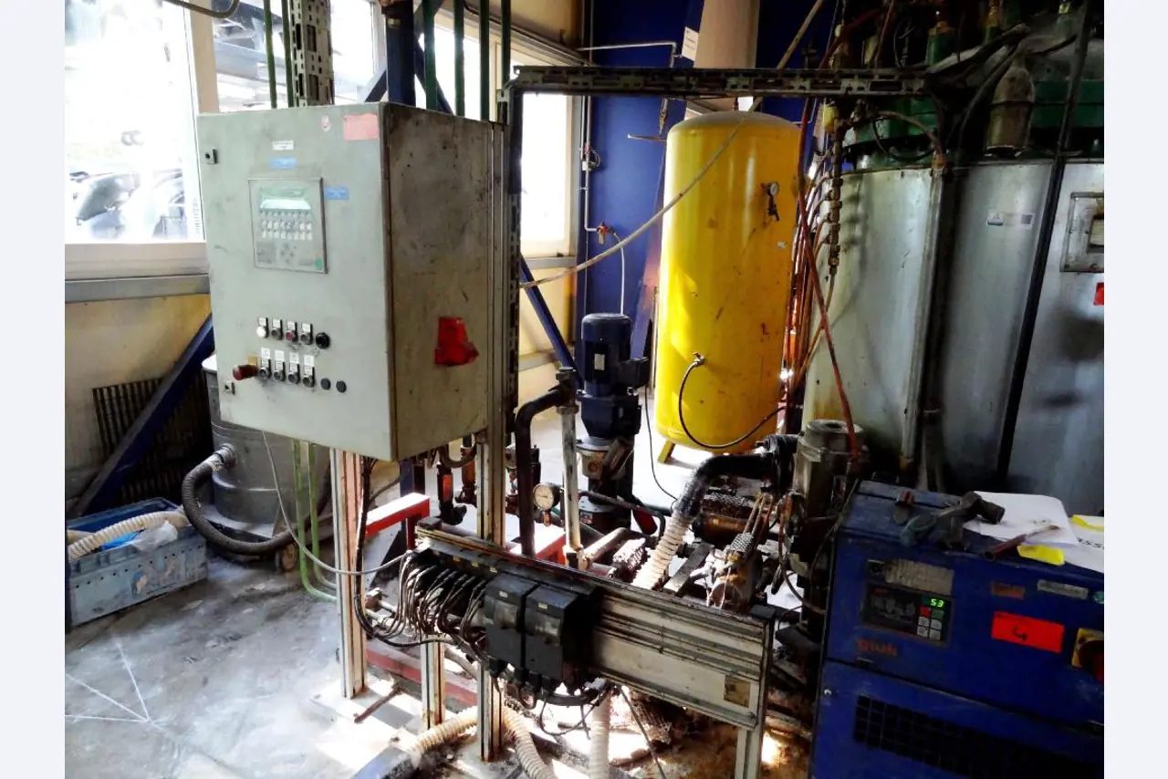 Machines for the manufacturing of foamed <br>and injected attachments and spare parts <br>for the automotive sector-11