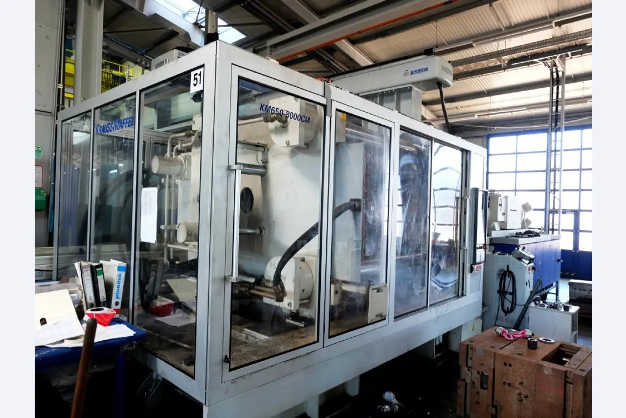 Machines for the manufacturing of foamed <br>and injected attachments and spare parts <br>for the automotive sector-1