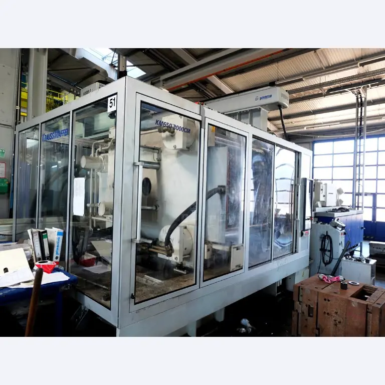 Machines for the manufacturing of foamed <br>and injected attachments and spare parts <br>for the automotive sector-1