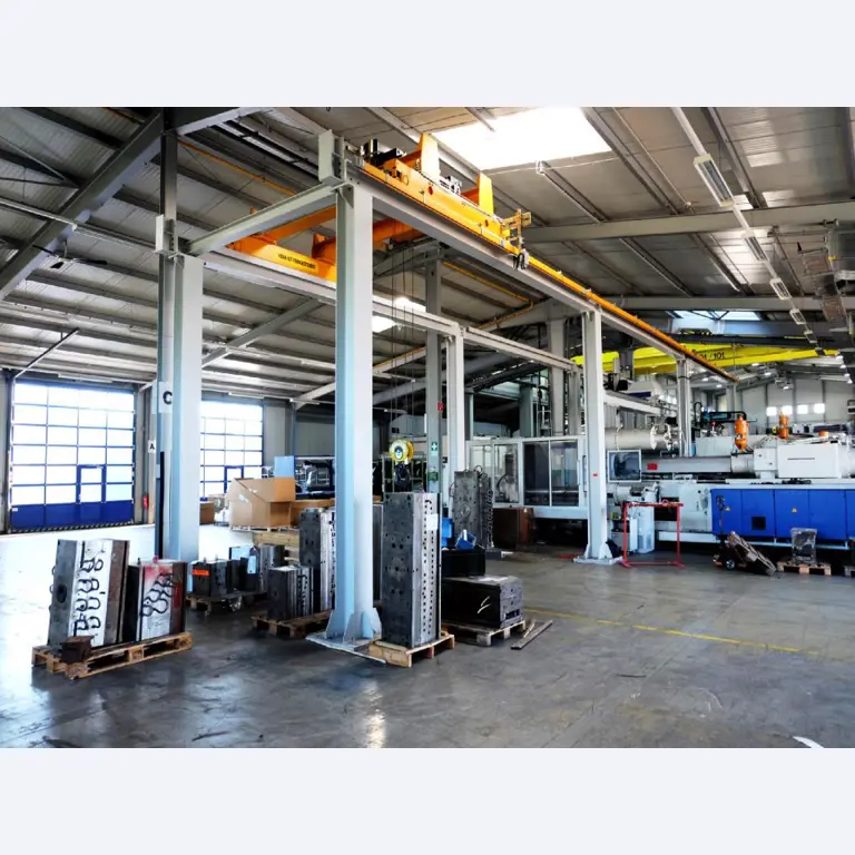 Machines for the manufacturing of foamed <br>and injected attachments and spare parts <br>for the automotive sector-1