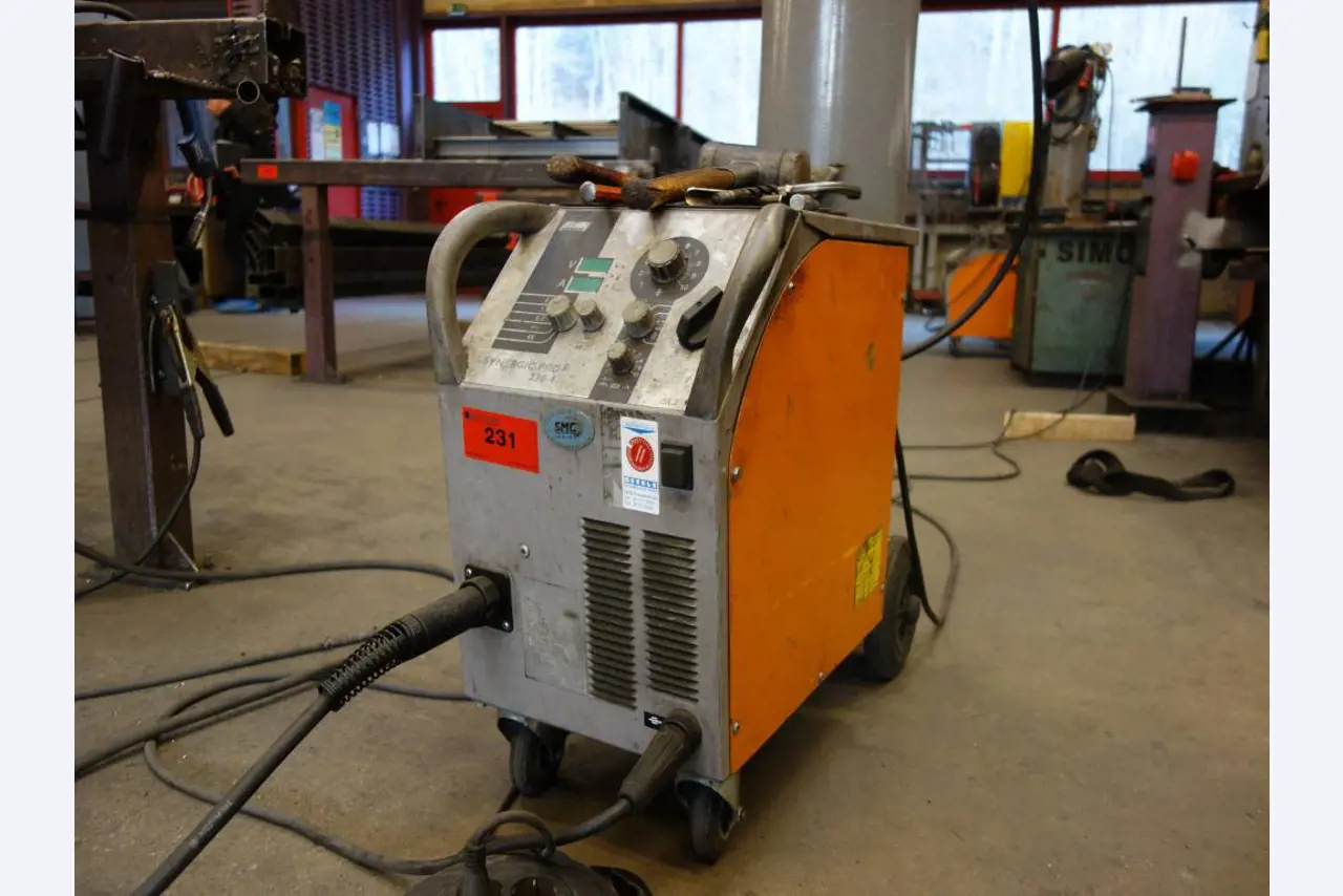 Machines for sheet metal working, business and office equipment as well as vehicle fleet-1