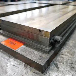 Magnetic clamping plate