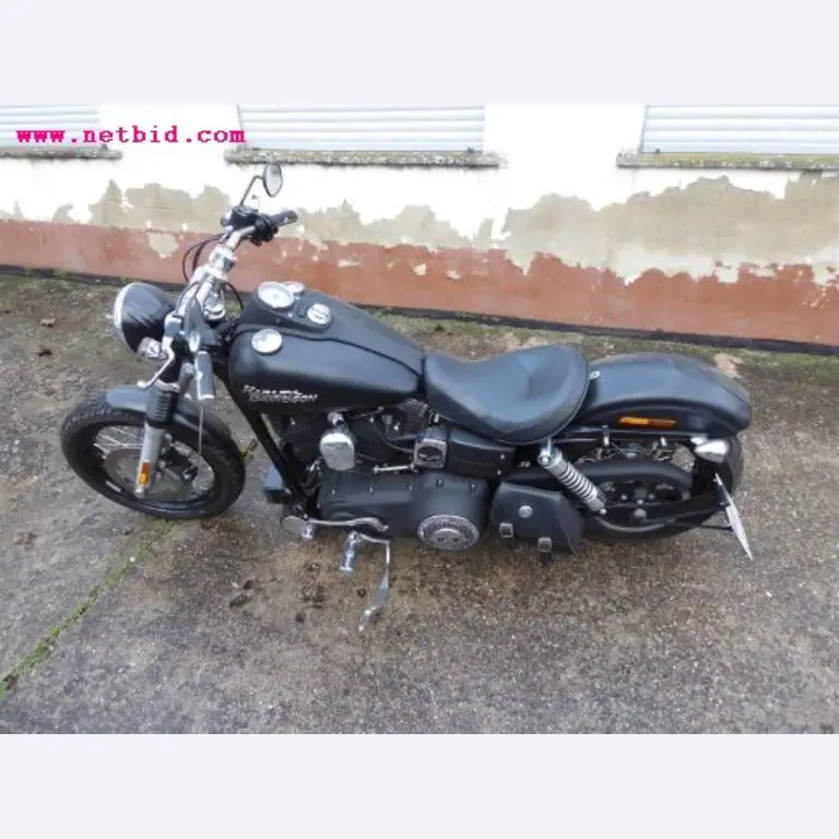 well-maintained vehicle fleet:<br>2 Porsche and 3 Harley Davidson-1