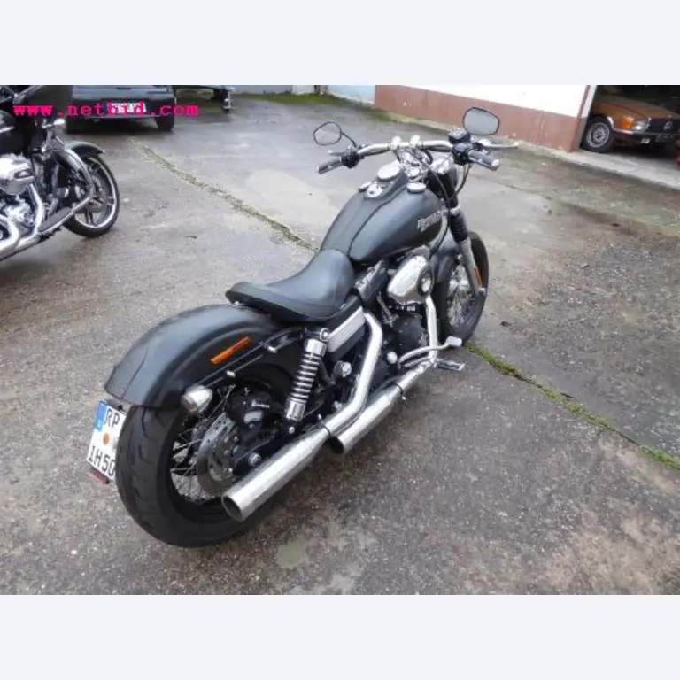 well-maintained vehicle fleet:<br>2 Porsche and 3 Harley Davidson-5