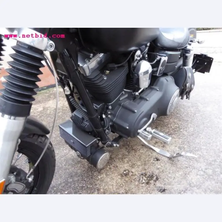 well-maintained vehicle fleet:<br>2 Porsche and 3 Harley Davidson-9