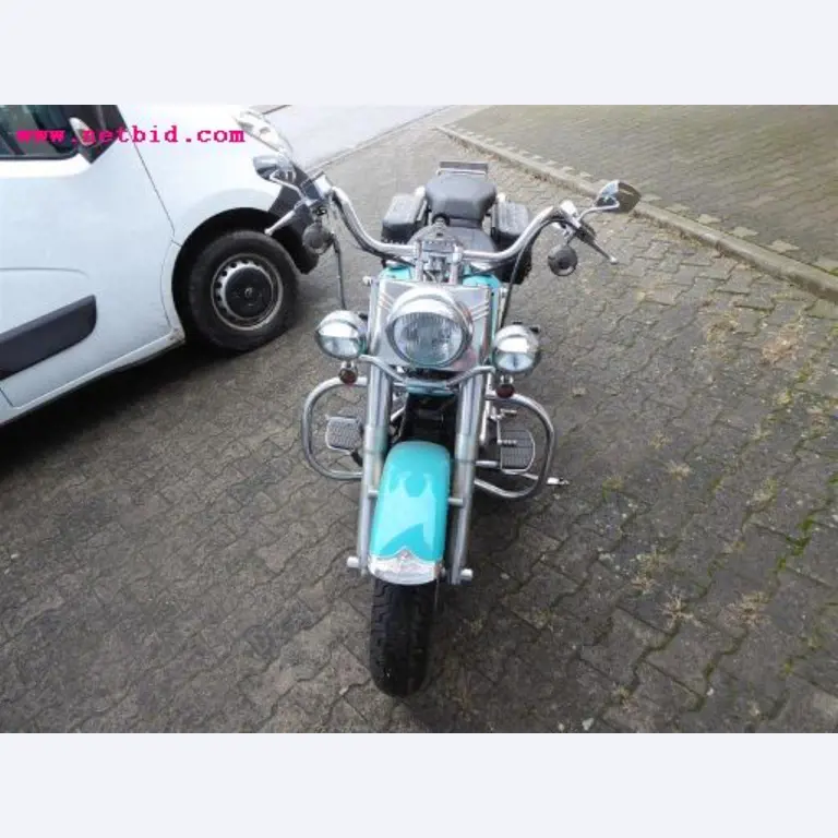 well-maintained vehicle fleet:<br>2 Porsche and 3 Harley Davidson-3