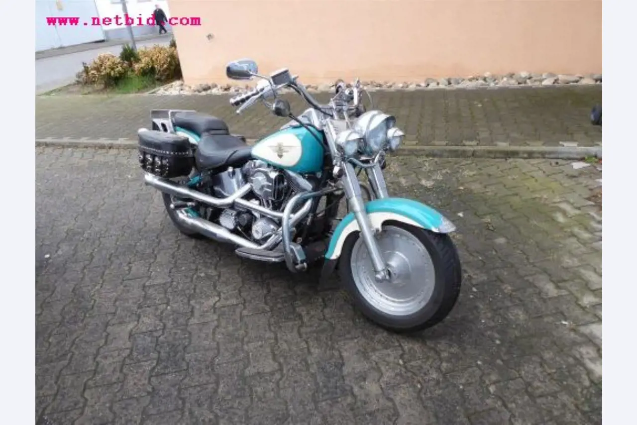 well-maintained vehicle fleet:<br>2 Porsche and 3 Harley Davidson-4