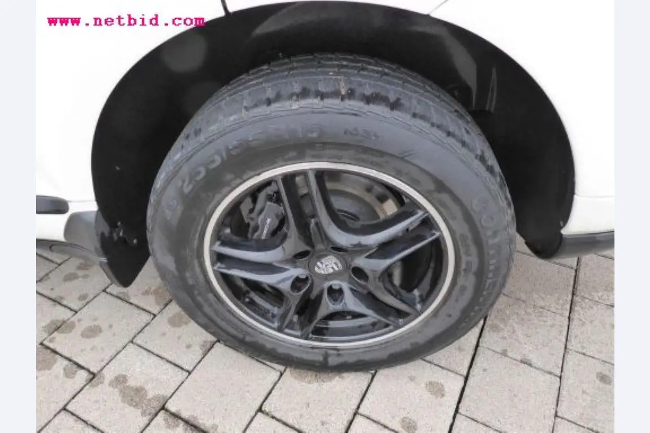 well-maintained vehicle fleet:<br>2 Porsche and 3 Harley Davidson-8