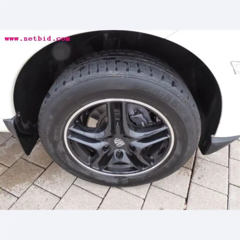 well-maintained vehicle fleet:<br>2 Porsche and 3 Harley Davidson-9