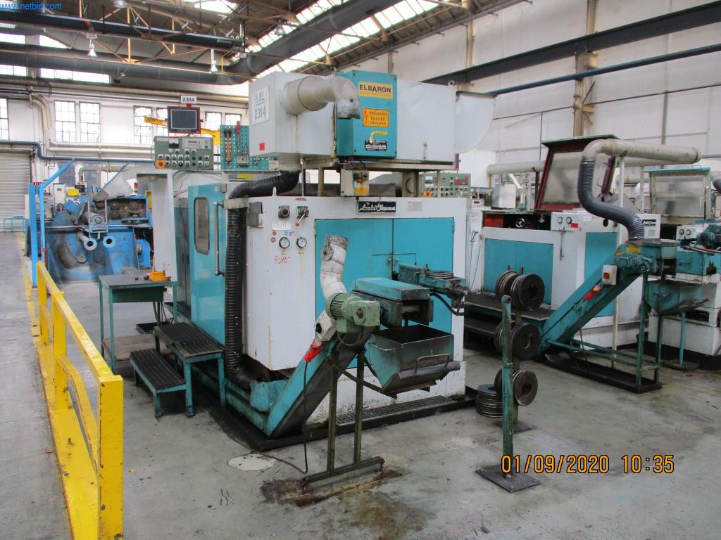 Máquinas para la fabricación de tornillos, pernos y elementos de fijación-1