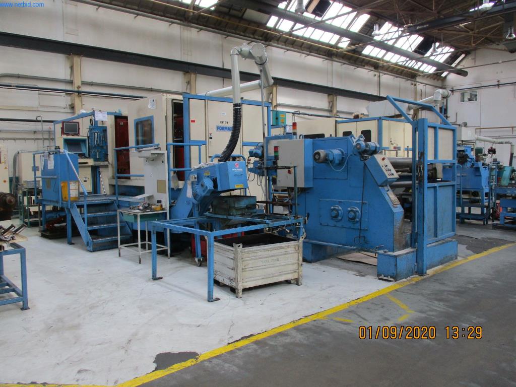 Máquinas para la fabricación de tornillos, pernos y elementos de fijación-1