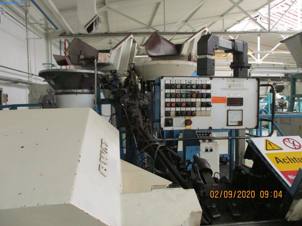 Máquinas para la fabricación de tornillos, pernos y elementos de fijación-4