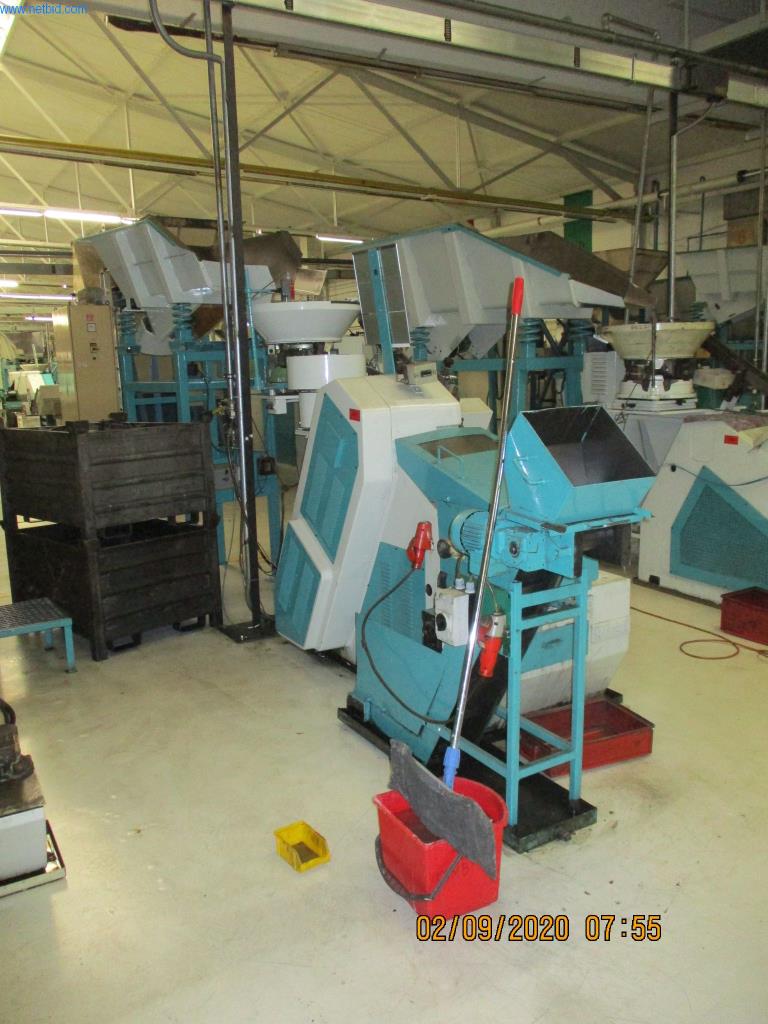 Máquinas para la fabricación de tornillos, pernos y elementos de fijación-1