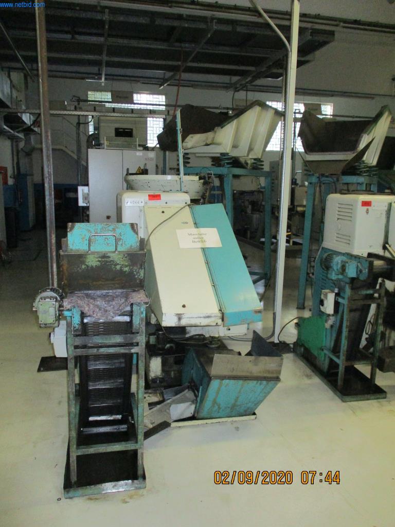 Máquinas para la fabricación de tornillos, pernos y elementos de fijación-1