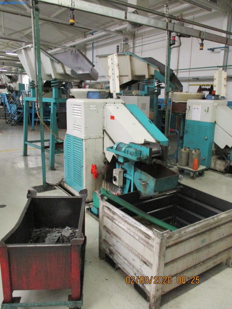 Máquinas para la fabricación de tornillos, pernos y elementos de fijación-1