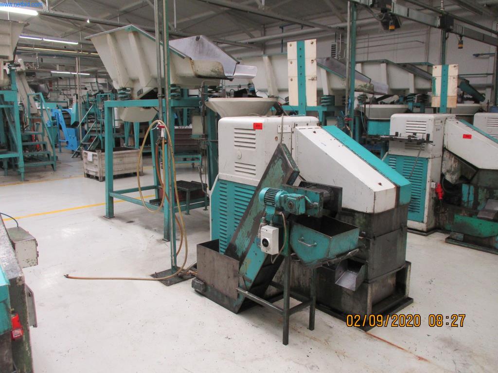 Máquinas para la fabricación de tornillos, pernos y elementos de fijación-1