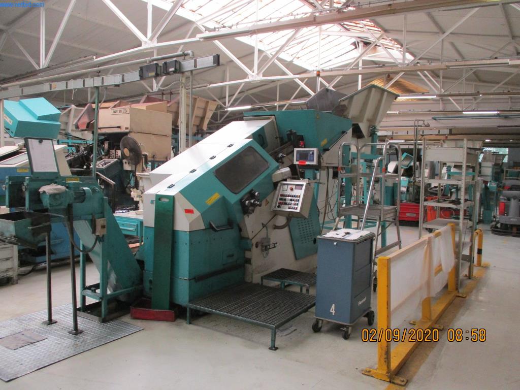 Máquinas para la fabricación de tornillos, pernos y elementos de fijación-1