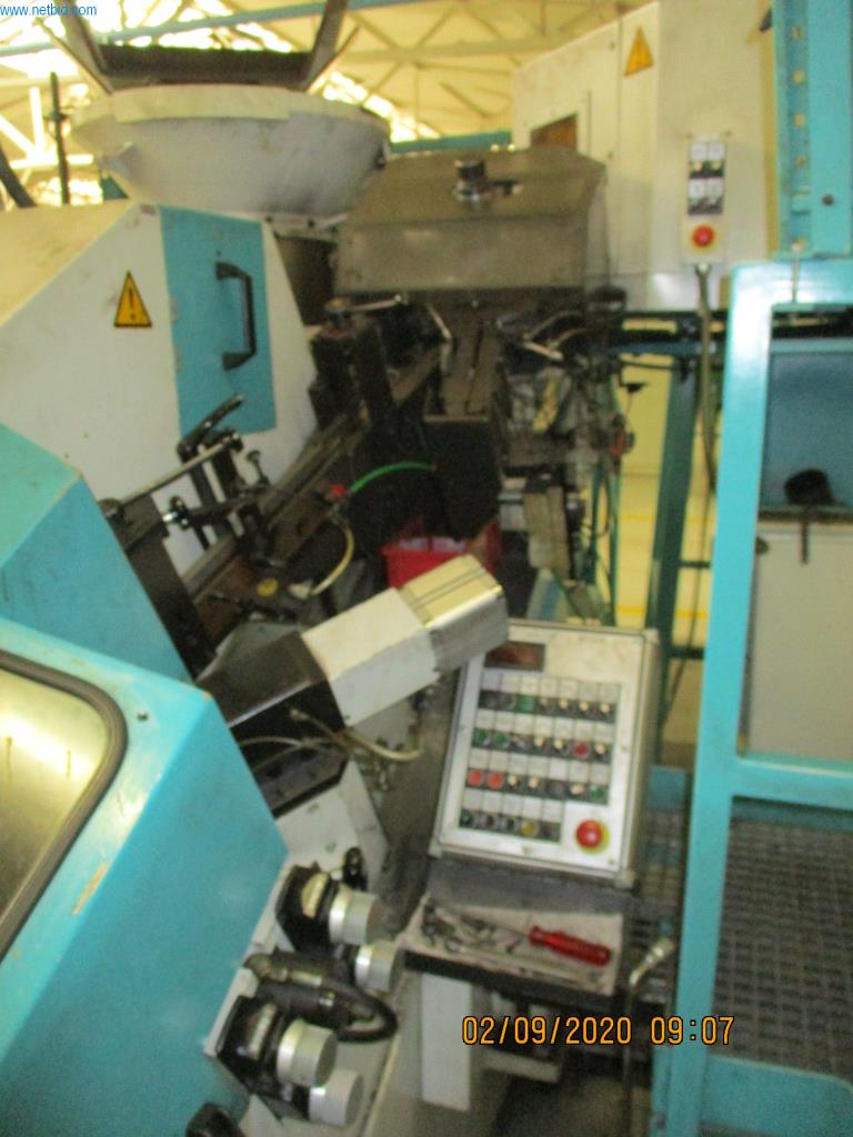 Máquinas para la fabricación de tornillos, pernos y elementos de fijación-4