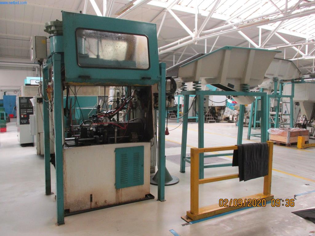 Máquinas para la fabricación de tornillos, pernos y elementos de fijación-1