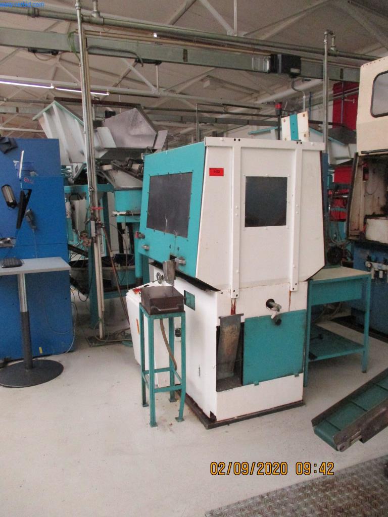 Máquinas para la fabricación de tornillos, pernos y elementos de fijación-1