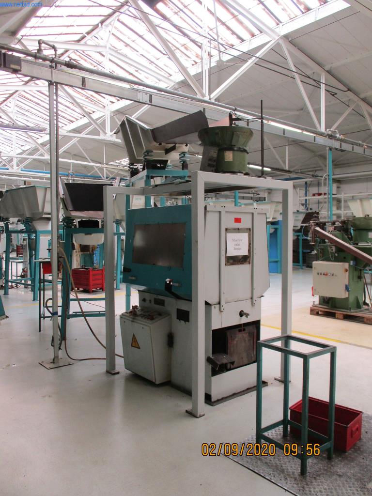 Máquinas para la fabricación de tornillos, pernos y elementos de fijación-1