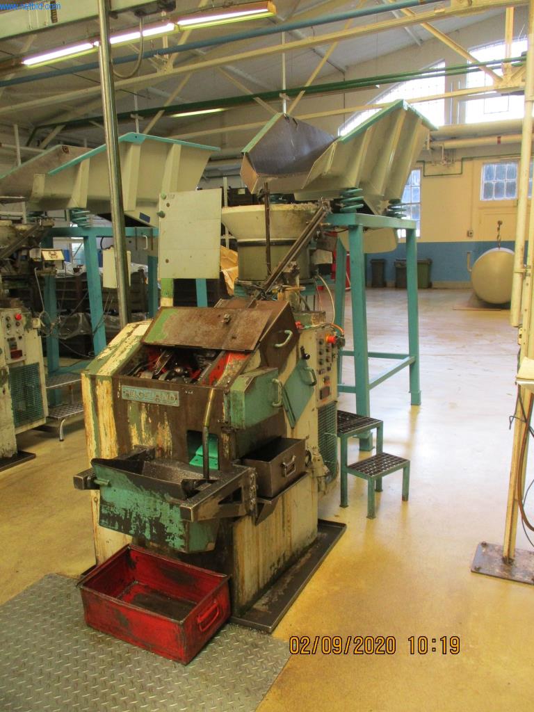 Máquinas para la fabricación de tornillos, pernos y elementos de fijación-1