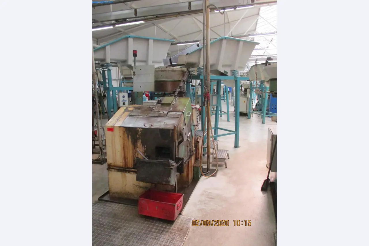 Máquinas para la fabricación de tornillos, pernos y elementos de fijación-1