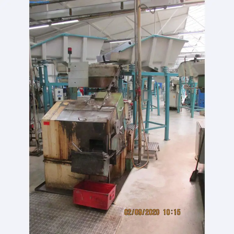 Máquinas para la fabricación de tornillos, pernos y elementos de fijación-1