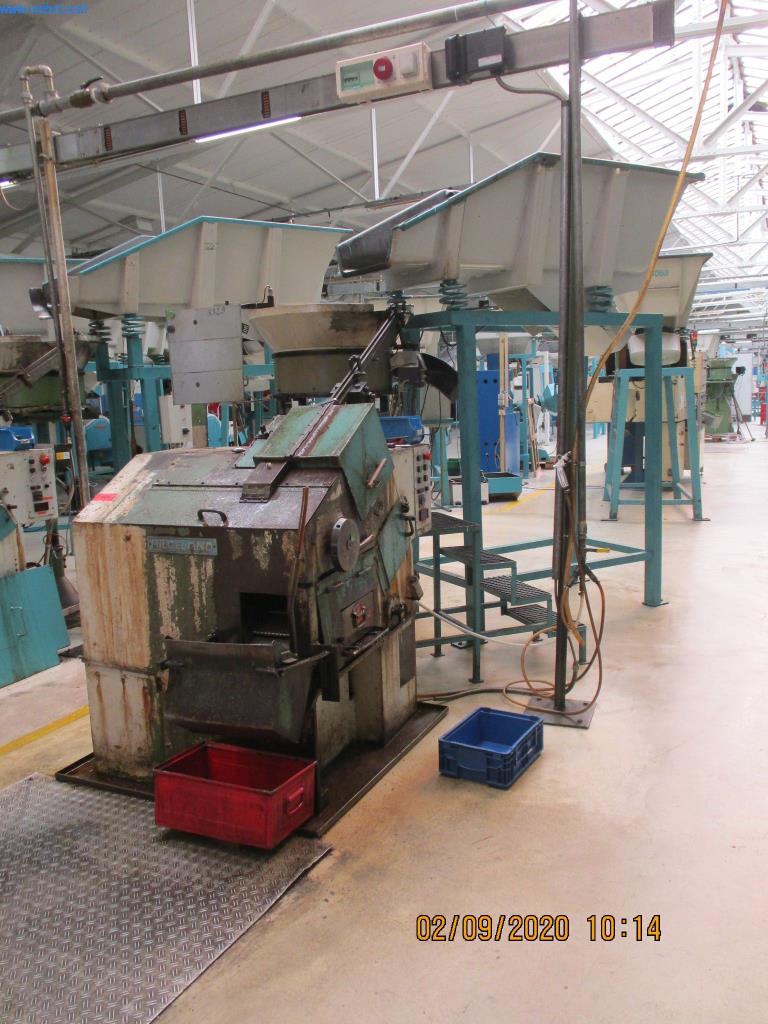 Máquinas para la fabricación de tornillos, pernos y elementos de fijación-1