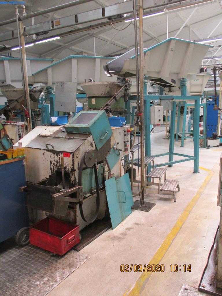 Máquinas para la fabricación de tornillos, pernos y elementos de fijación-1