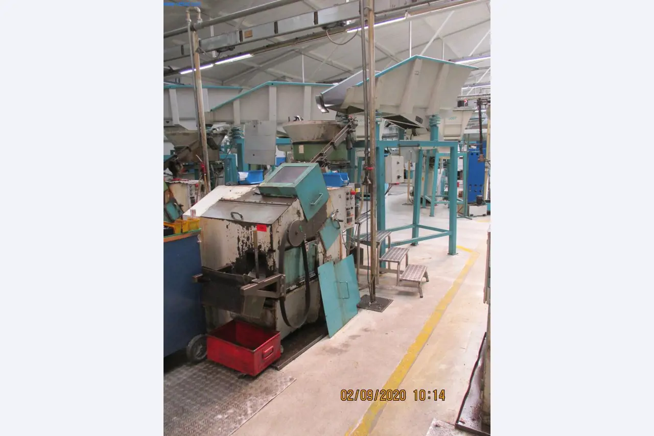 Máquinas para la fabricación de tornillos, pernos y elementos de fijación-1