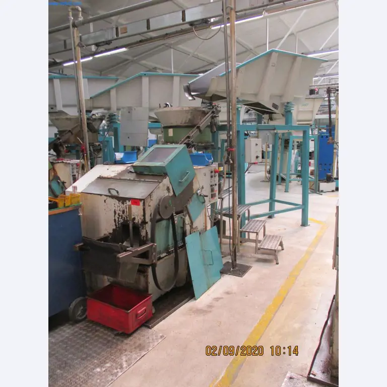 Máquinas para la fabricación de tornillos, pernos y elementos de fijación-1