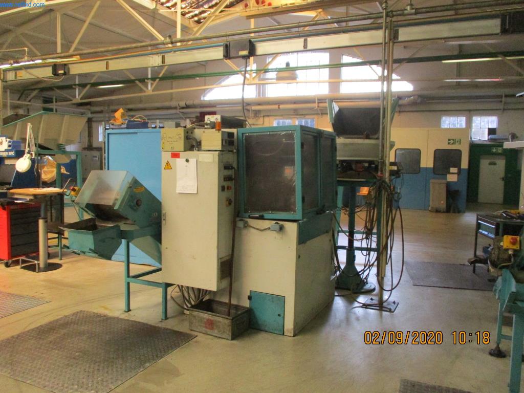 Máquinas para la fabricación de tornillos, pernos y elementos de fijación-1