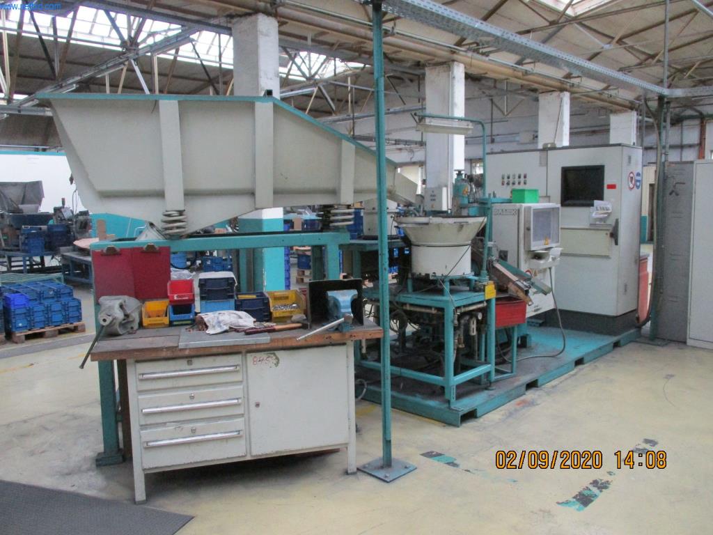 Máquinas para la fabricación de tornillos, pernos y elementos de fijación-1