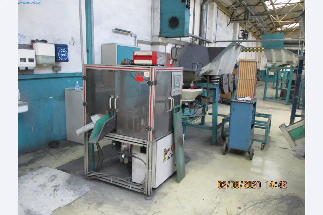 Máquinas para la fabricación de tornillos, pernos y elementos de fijación-1