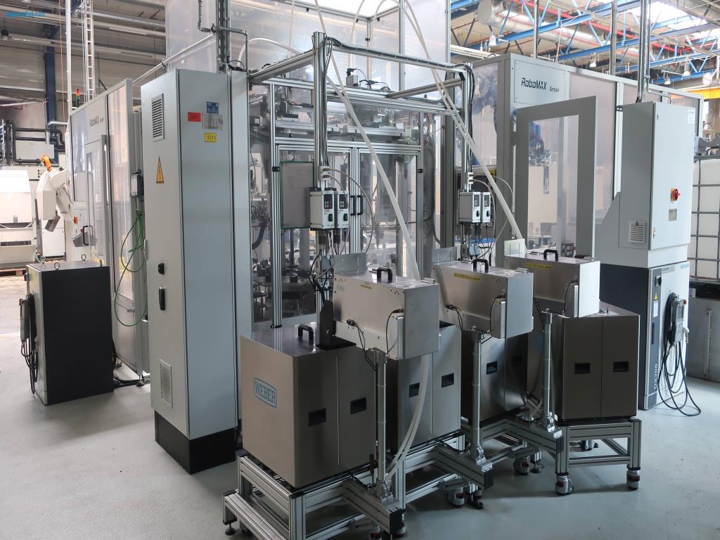 Máquinas para processamento mecânico, ensaio, limpeza e manuseamento de peças de alumínio fundido sob pressão-1