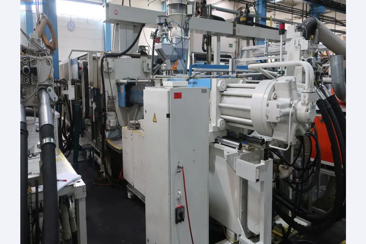 Machines and technical systems in the field of plastic injection molding (1600 - 23000 kN)-1