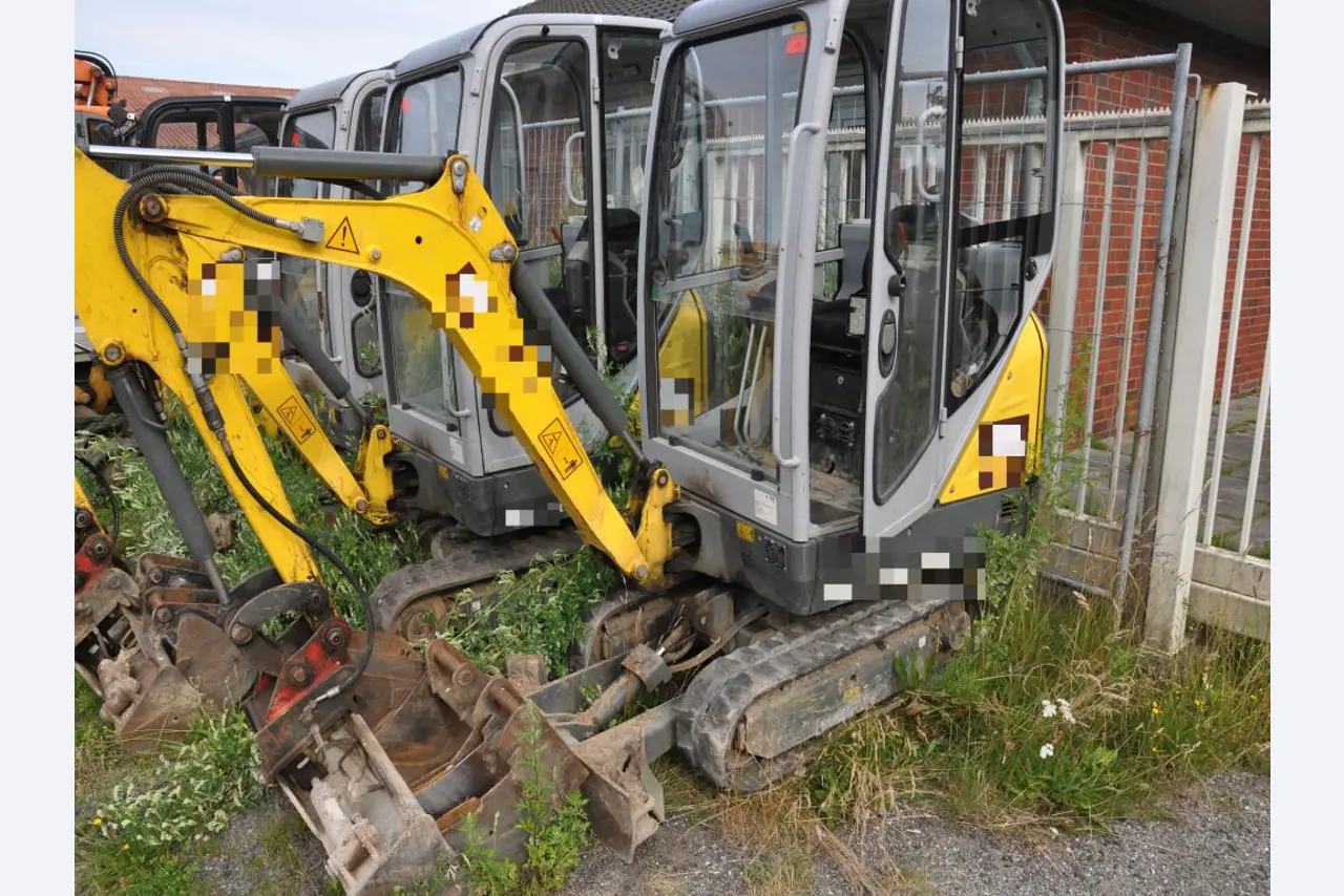 Modern, well-maintained construction and site vehicles as well as other mechanical equipment from the civil engineering sector-1