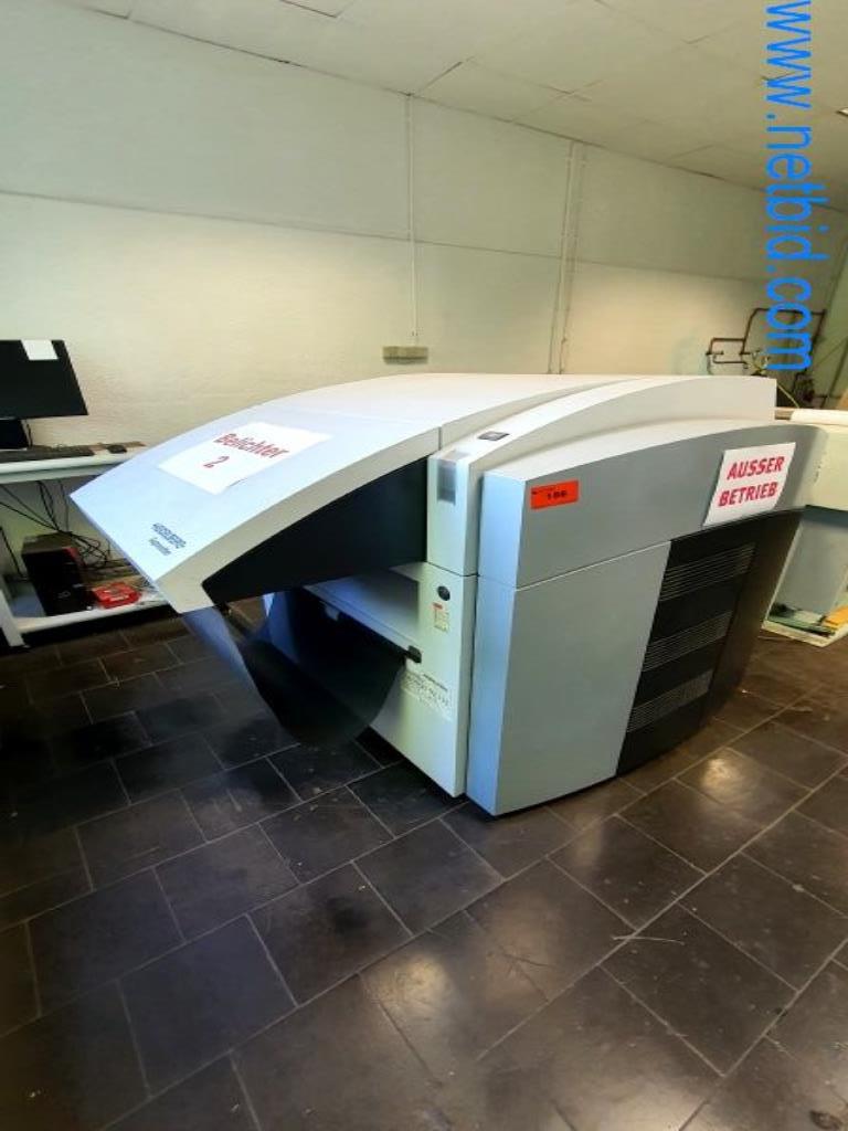 Stroje v tiskárně
-1