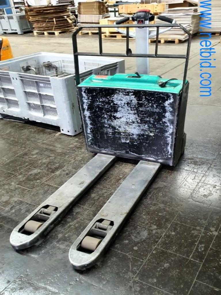 Stroje v tiskárně
-1