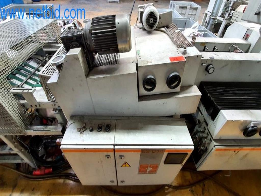 Stroje v tiskárně
-1