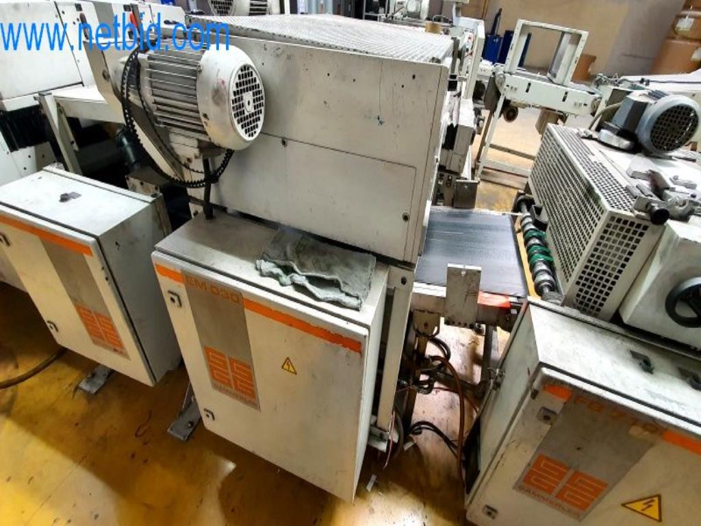 Stroje v tiskárně
-1