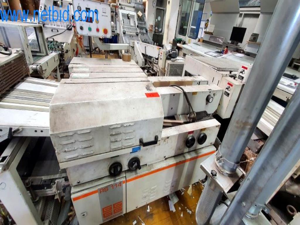 Stroje v tiskárně
-1