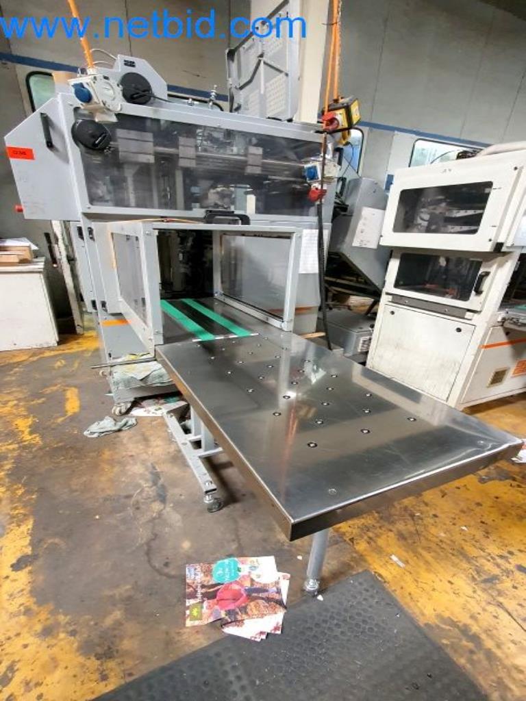 Stroje v tiskárně
-1