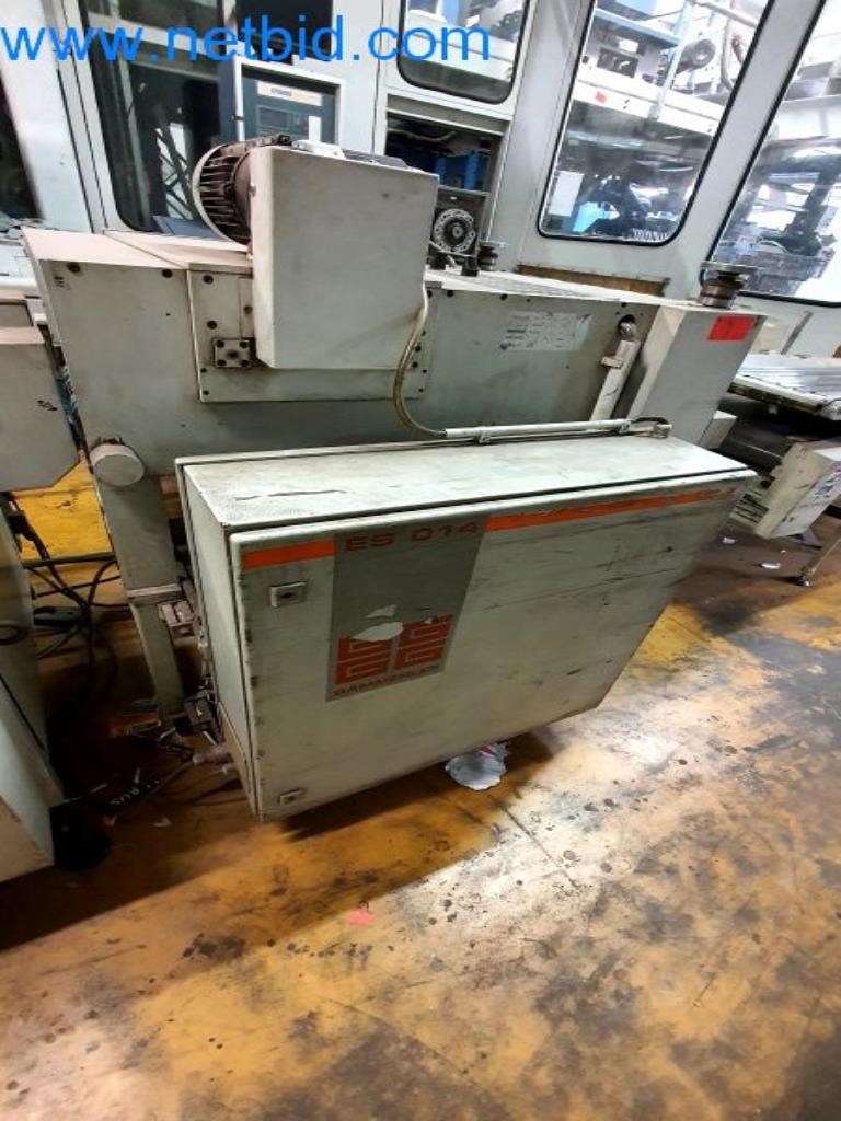 Stroje v tiskárně
-1